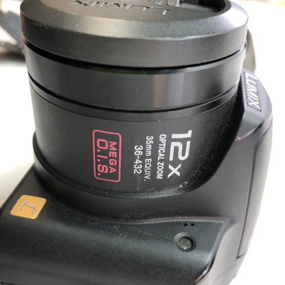 Panasonic dmc-fz7 12.1MP Digital Camera w OEM Battery Charger and Carrying Case